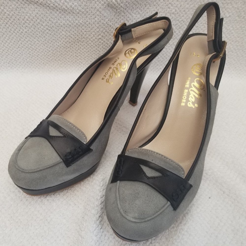 Grey suede leather pumps . New and Unworn.